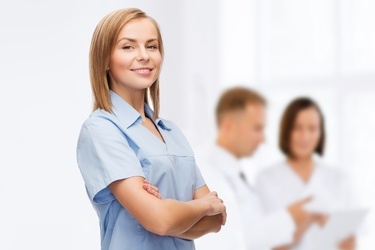 smiling female doctor or nurse